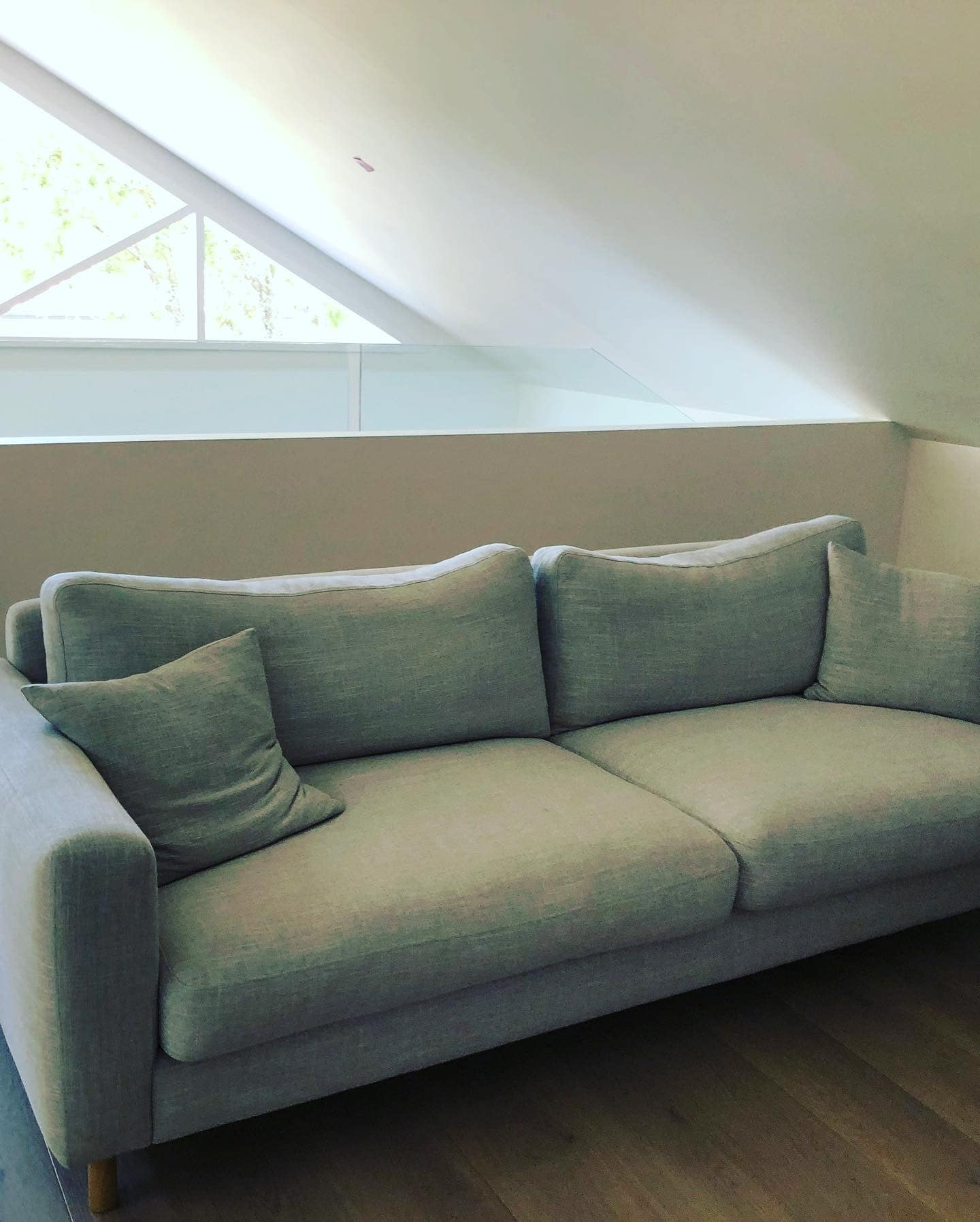 Bexley North comfortable lounge area under gable window