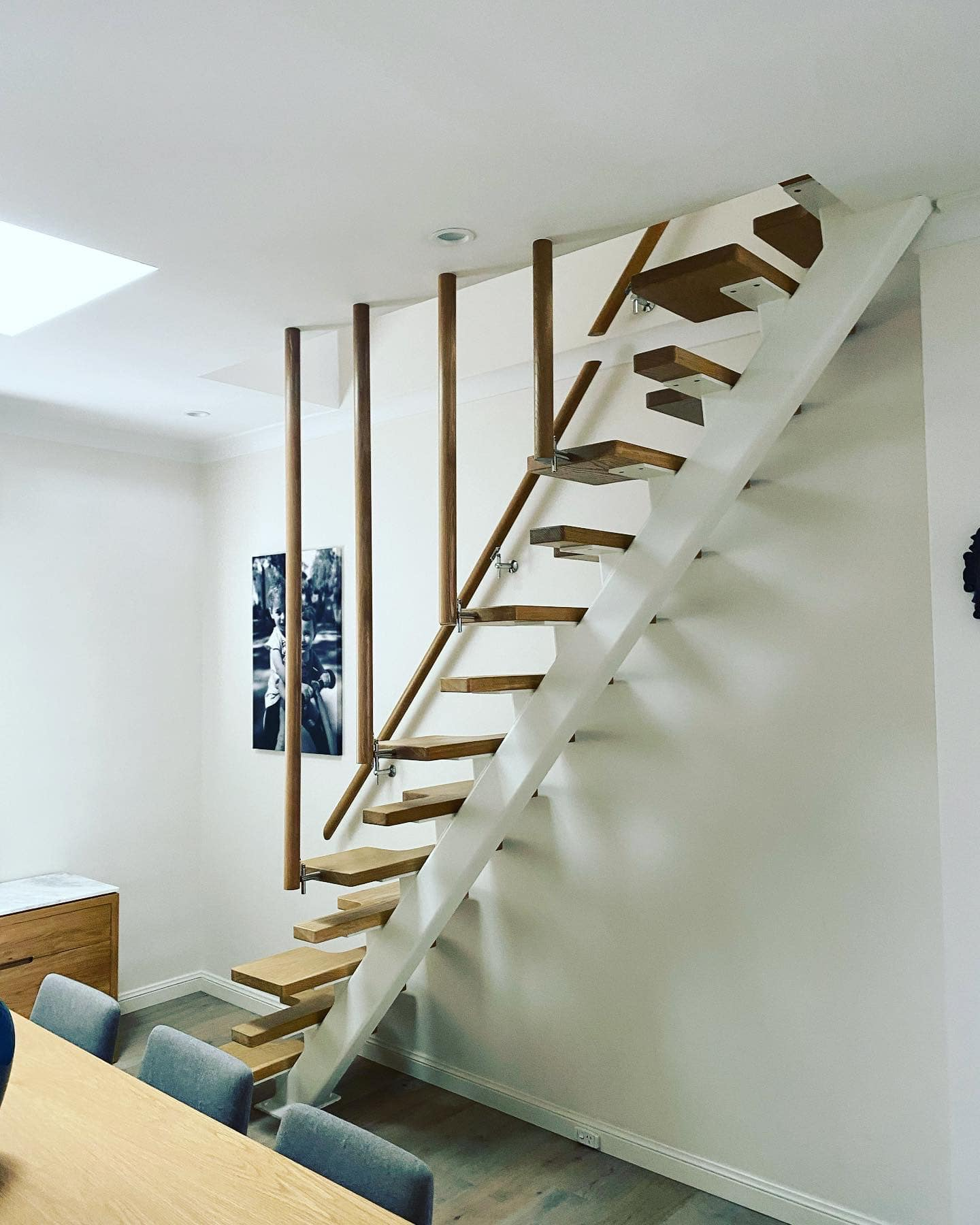 Bexley North elegant open staircase with timber post balustrade