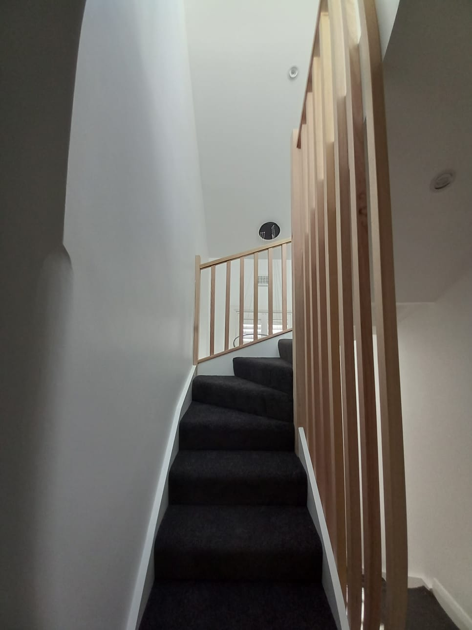 Bronte timber balustrade staircase with dark carpet
