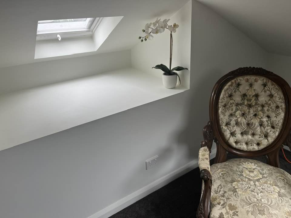 Concord attic detail showing skylight nook and chair