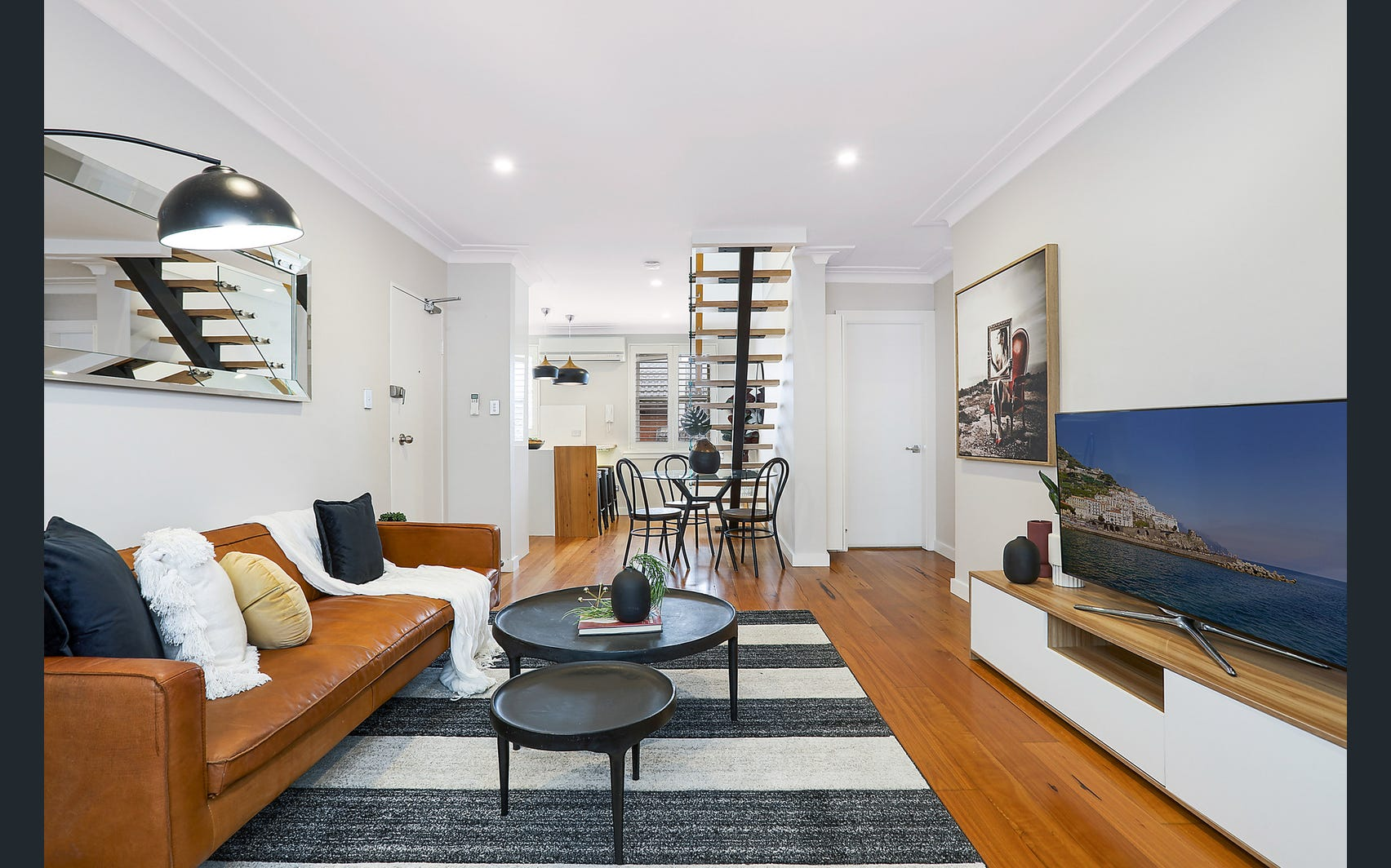 Randwick open plan living with staircase to attic